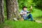 Mushrooming in forest, Grandfather hunting mushrooms over summer forest background. Mushroomer gathering Mushroom