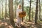 Mushrooming, woman picking mushrooms in the forest