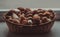 Mushrooms in a basket on a dark background. Boletus edulis, penny bun, ceps, porcini