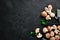 Mushrooms on a black stone background. Champignons Top view.