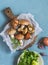 Mushrooms, vegetables, herbs, spices on a blue background, top view