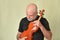 music adult man with violin string instrument played in orchestra classical music