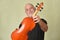 music adult man with violin string instrument played in orchestra classical music