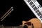 Music background with acoustic guitar, music keys and drum sticks, flat lay.