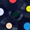 Music background retro vinyl discs closeup, sound disco concept