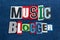 MUSIC BLOGGER text word collage colorful fabric on blue denim, music blogs and blogging