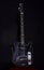 Music and hard rock concept. Guitar in deep black color