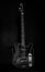 Music and hard rock concept. Guitar in deep black color