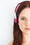 Music headphones, half face and woman portrait listening to calm girl song, wellness audio podcast or radio sound