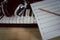 Music instruments concept background. Close up group of musical tools for musician create song with the pencil on paper note and