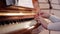 Music lesson. Girl playing piano. Close up on piano keys, child hands and fingers. Slider view of playing