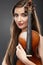 Music portrait of young woman. Violin play.