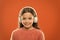 Music produces pleasure. Perfect sound stereo headphones. Girl cute little child wear headphones listen music. Kid