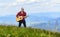 Music for soul. Playing music. Sound of freedom. Acoustic music. Keep calm and play guitar. Man hiker with guitar on top