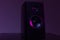 music speaker from home theater on dark background with purple backlight, music industry professionals concept