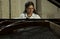 Music Teacher And Grand Piano