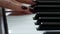 The music teacher plays the piano. closeup female hands with manicure play the piano keys. Music training. Piano concert. Playing