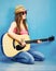 Music woman portrait with guitar