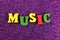 Music word made of bright colored letters