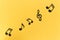 Musical background. notes on a yellow background.