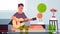 Musical blogger recording online video stream for vlog male vlogger playing guitar blogging concept modern living room