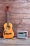 Musical equipment on wooden background.