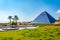 Musical fountain and a blue pyramide at gan binyamin park in Eilat, Israel