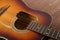 Musical instrument - Closeup fragment Broken classic acoustic guitar