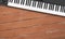 Musical instrument - Fragment Black MIDI keyboard wood background