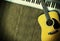 Musical instrument - MIDI keyboard and acoustic guitar wood back