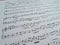 Musical notes closeup. Musical work classic and symphony concept