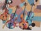 Musical violins on a multi-colored background