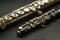 Musical wind instrument piccolo flute and brass flute.