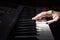 Musician at a concert playing piano