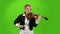 Musician girl plays the violin composition. Green screen