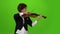 Musician girl plays the violin . Green screen