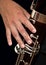 Musician hand playing the bassoon