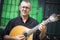 Musician with his beloved unique portuguese guitar, Portugal