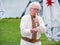 Musician man plying sopilka ethnic woodwind musical flute family instrument. Music festival in Lviv, Ukraine May 14 2022