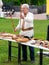 Musician man plying sopilka ethnic woodwind musical flute family instrument. Music festival in Lviv, Ukraine May 14 2022