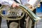 Musician of military brass band holding tuba in his hand