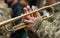 Musician of military orchestra of the Ukrainian army plays the trumpet