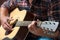 Musician playing acoustic guitar