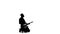 Musician playing on electric bass guitar on his knees. Silhouette