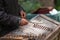 Musician playing hammered dulcimer with mallets