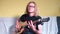 Musician rehearses on an acoustic guitar before performing at a concert.