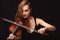 Musician\'s engrossed artistry through violin expression