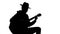 Musician silhouette singing and playing guitar at concert, art leisure, talent