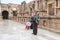 Musicians in national costumes play for tourists on the bagpipes and the drum in Southern Theatre in ruins of Roman city Jerash -