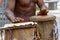 Musicians playing traditional instruments used in capoeira